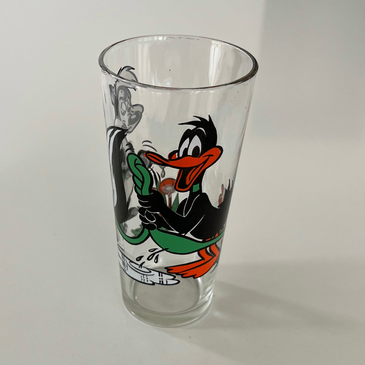 Vintage 1976 Pepe Le Pew and Daffy Duck Looney Tunes Drinking Glass