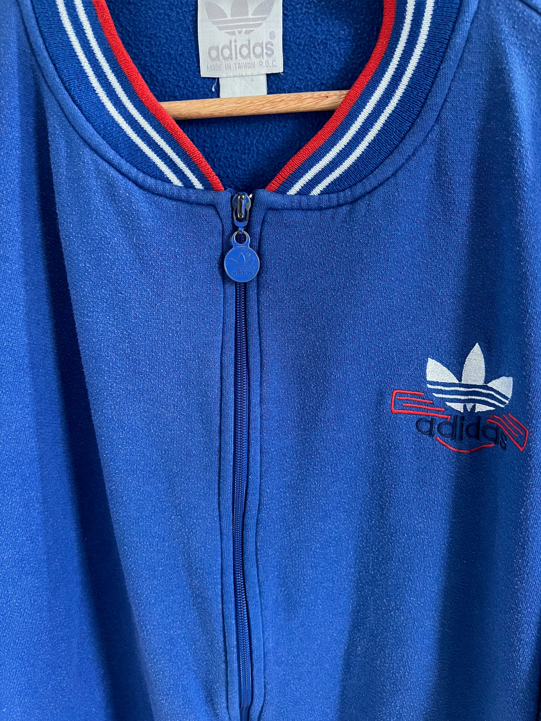 Vintage Adidas Blue track Jacket.  Blue with red and white trim.