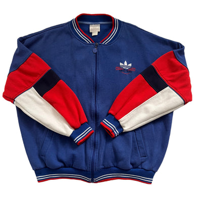 Vintage Adidas Blue track Jacket.  Blue with red and white trim.